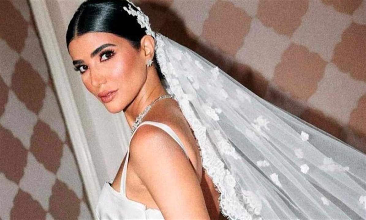 ريم سامي تتأثر وتبكي في زفافها خلال رقصها مع والدها 