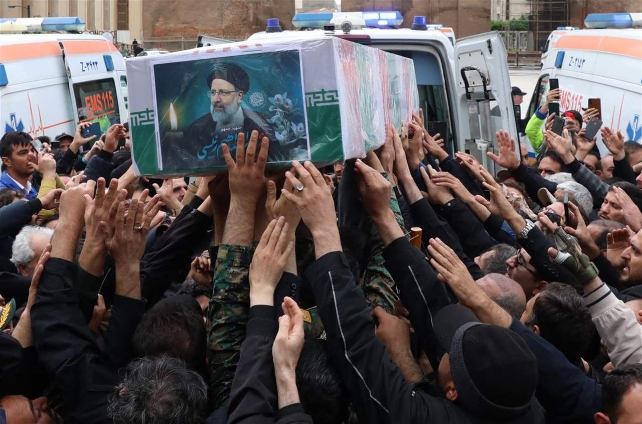 دفن الرئيس الإيراني الراحل في مدينة مشهد